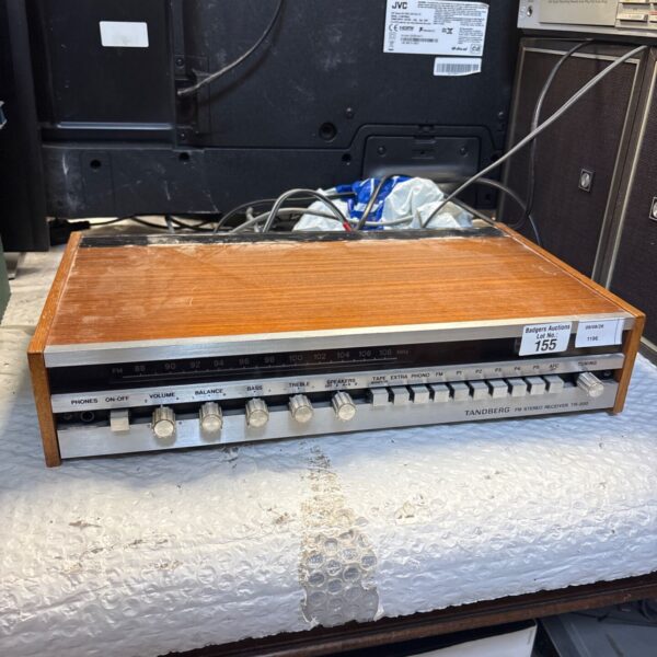 Vintage Tandberg TR-200 FM stereo receiver with tuning dial.