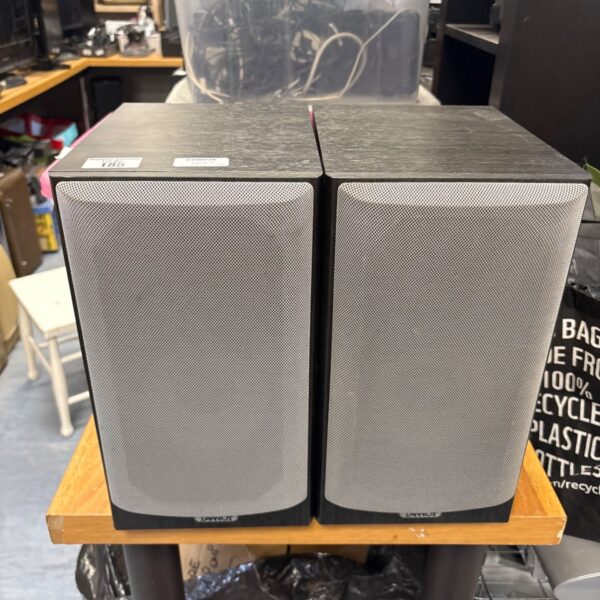 Dark oak Tannoy Mercury Mx2 speakers for vintage audio systems.