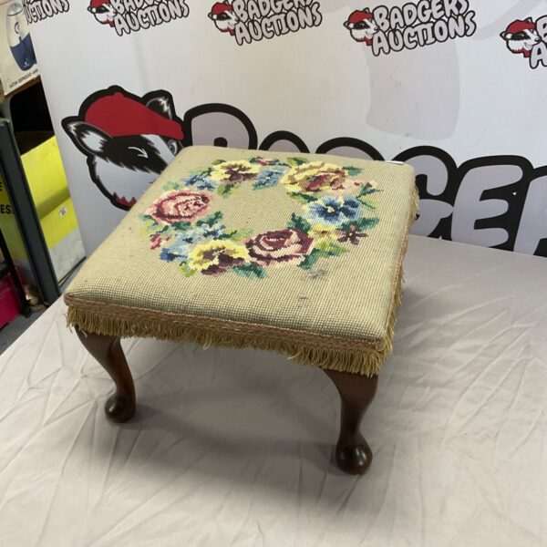 Vintage tapestry footstool with a beautiful floral pattern.