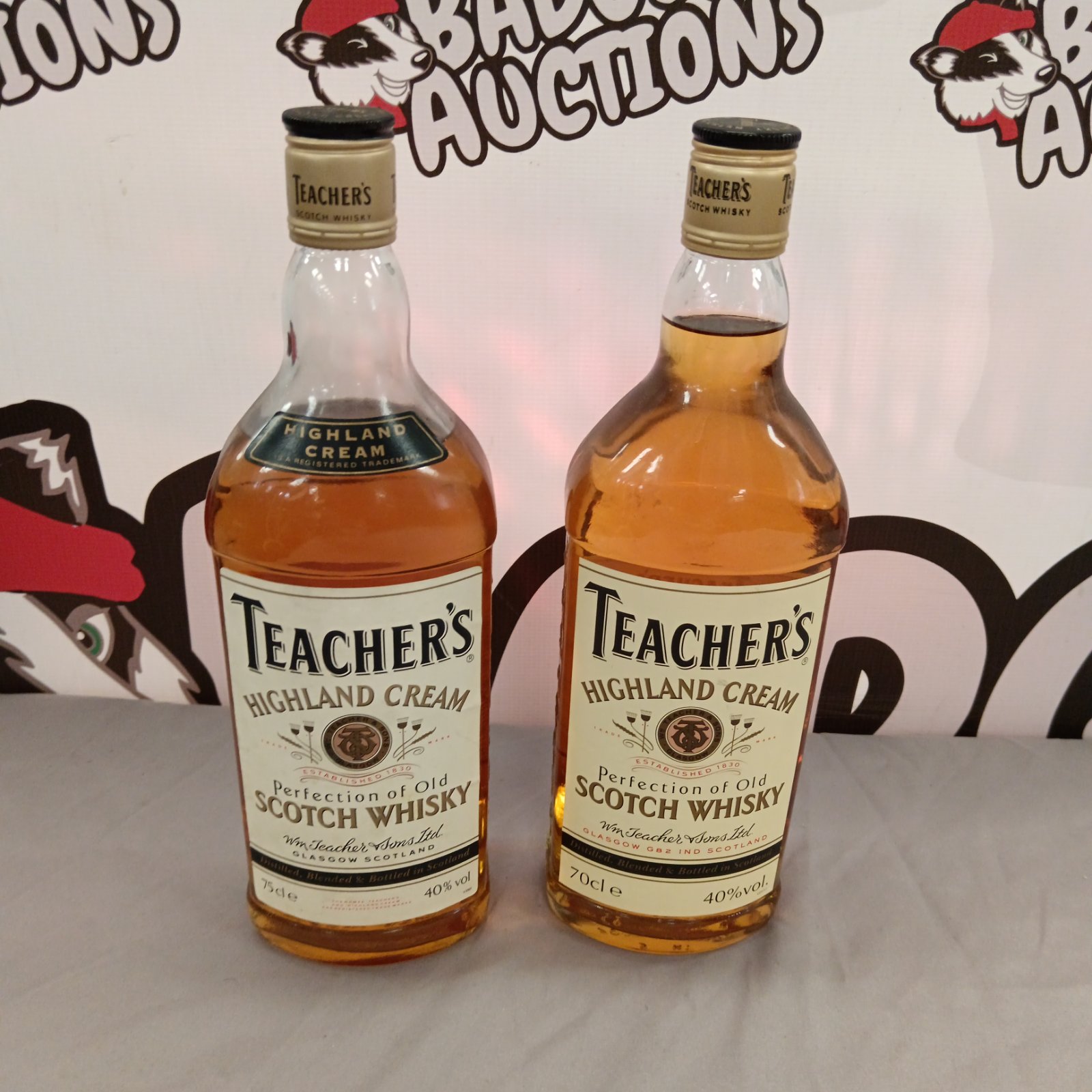 Two bottles of vintage Teacher's Highland Cream Scotch Whisky.
