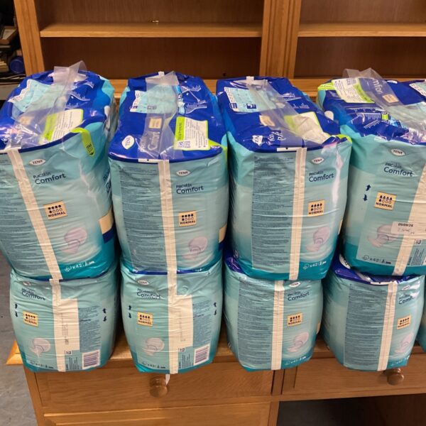 Lot of eight unopened Tena Proskin Comfort incontinence pads.