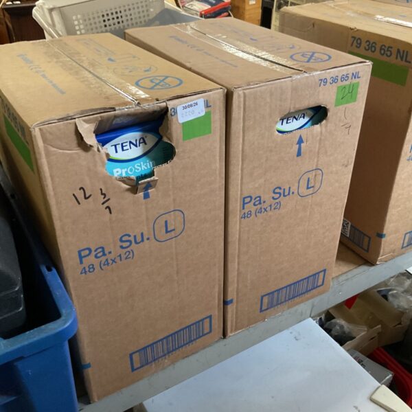 Two boxes of TENA Proskin incontinence pants in original packaging.