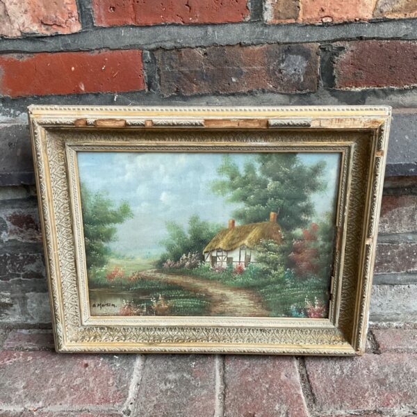 Vintage oil painting of a thatched cottage in a country landscape.