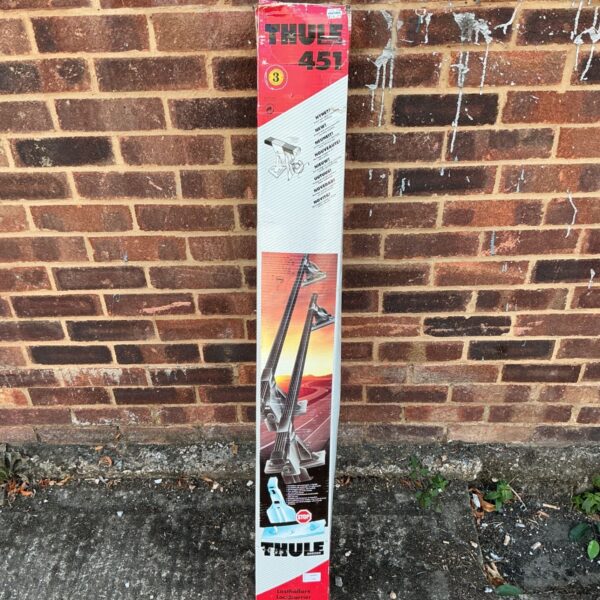 Thule 451 roof rack bars in original packaging.