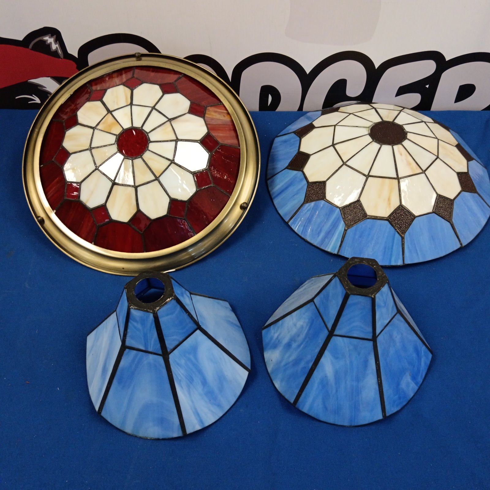 Tiffany style light shade with floral stained glass design.