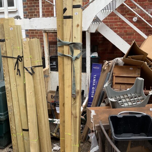 Bundle of timber wood for DIY projects and construction.