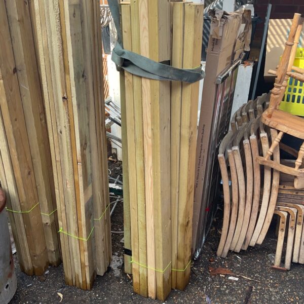 Three bundles of approximately 5 foot timber for DIY projects.