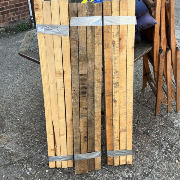 Bundles of softwood 2x4 timber for DIY and construction projects.