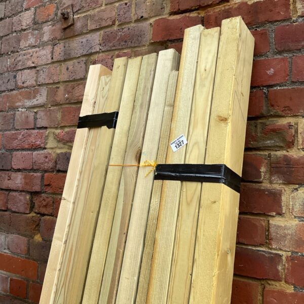 Three bundles of 7ft timber planks for construction and DIY projects.