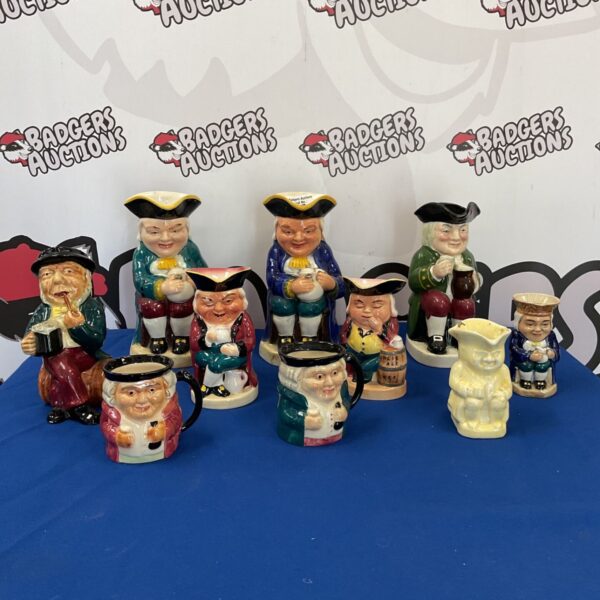 Vintage collection of toby and character jugs including Burlington Ware.