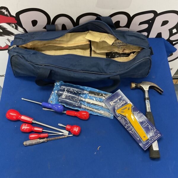 Vintage tool set with hammer, screwdrivers, and chisels for DIY projects.