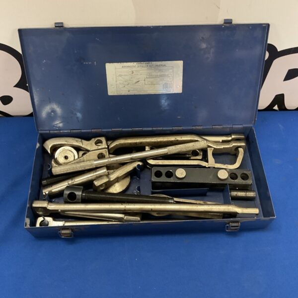 Vintage Toyota Universal Puller Set with various components.