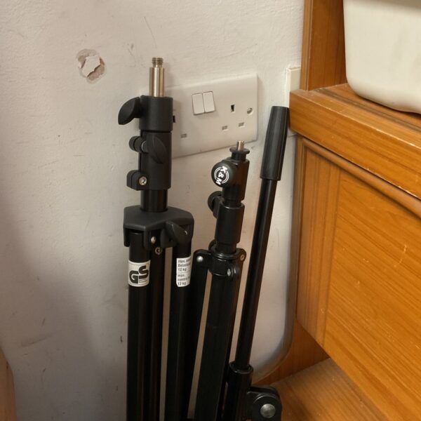 K&M tripod and microphone stand bundle for photography and audio.