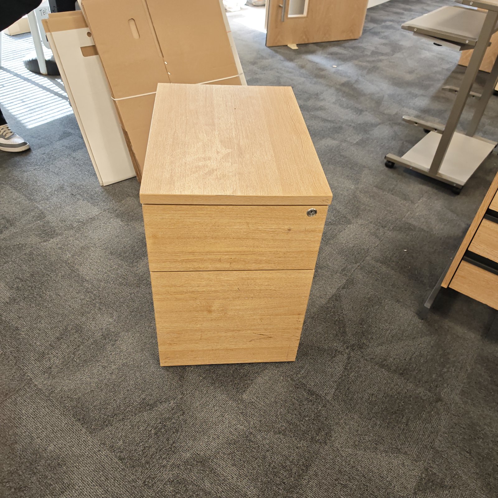 Wooden two drawer cabinet for bedroom or office storage.