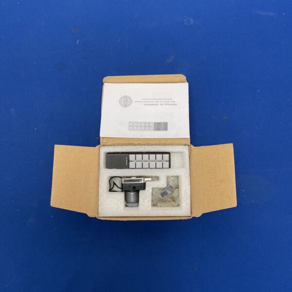 Vintage vertical keypad lock with round knob.