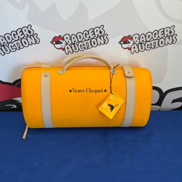 Yellow Veuve Clicquot champagne bag with logo and handles.