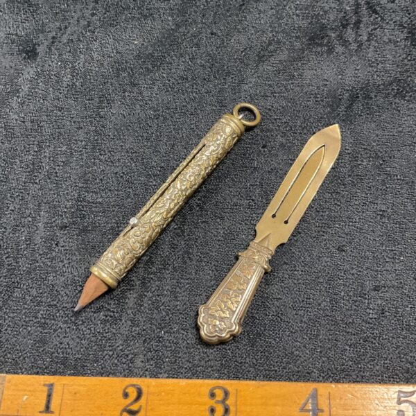 Antique Victorian gilded telescopic pencil with page marker.