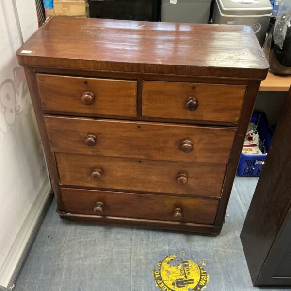Antique Victorian mahogany chest of drawers with three drawers.