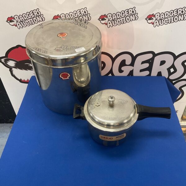Stainless steel Vinod pressure cooker with Tisha container.