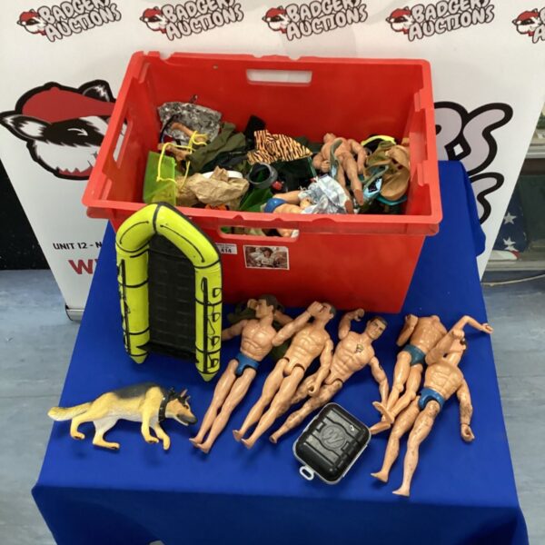 Vintage Action Man figures and accessories in a red box.