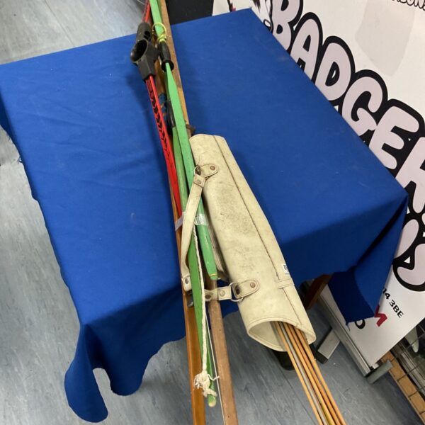Vintage archery bows and arrows lot for collectors.