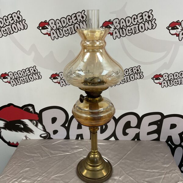 Vintage brass oil lamp with lustre glass shade.
