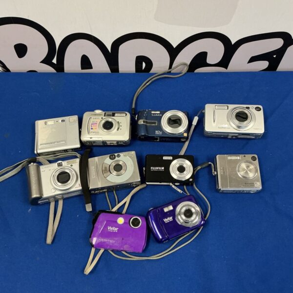 Vintage camera lot including Minolta, Fujifilm, and Vivitar cameras.