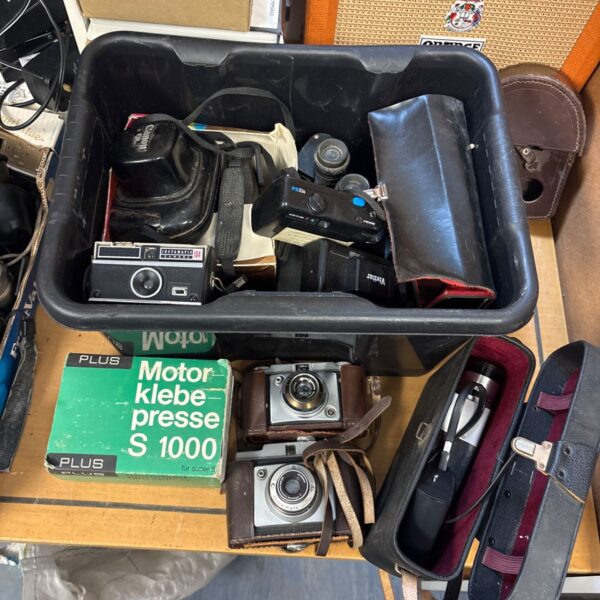 Vintage camera lot with Canon and Vivitar accessories in Oxford.