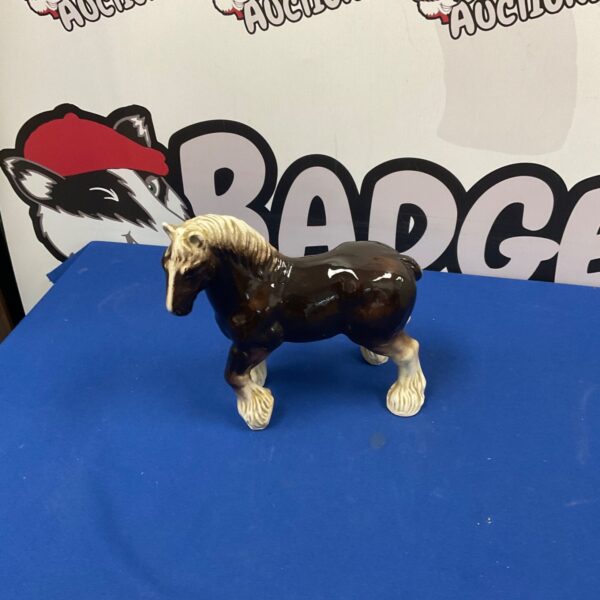 Vintage ceramic Shire horse figurine, detailed and collectible.