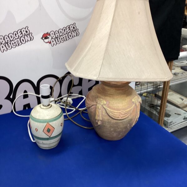 Vintage ceramic table lamp with neutral shade for home decor.