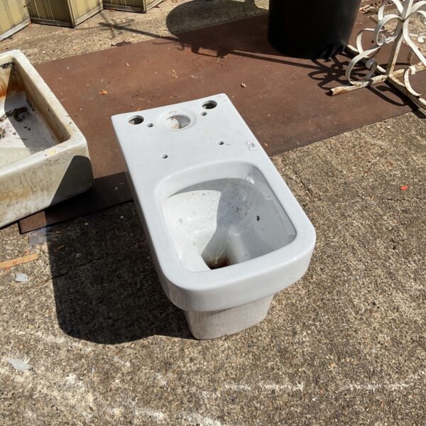 Vintage ceramic toilet pan, a classic bathroom fixture.