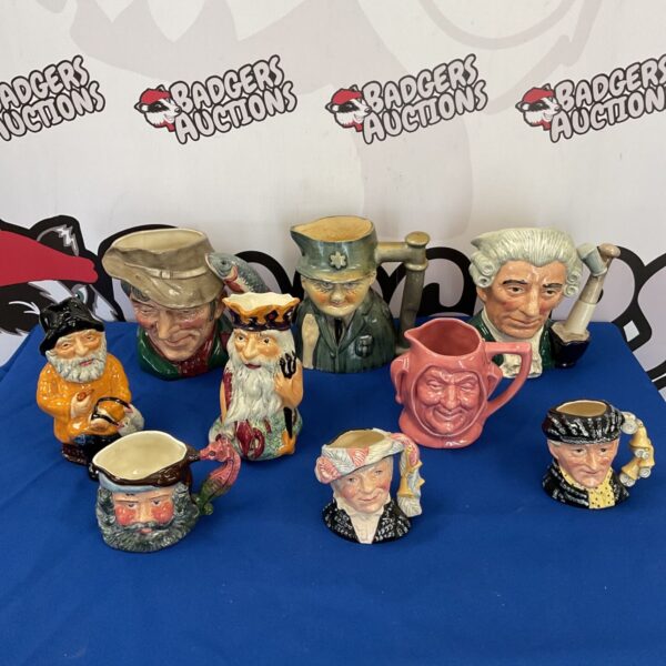 Vintage character jugs collection including Royal Doulton and Fiskeerman pieces.