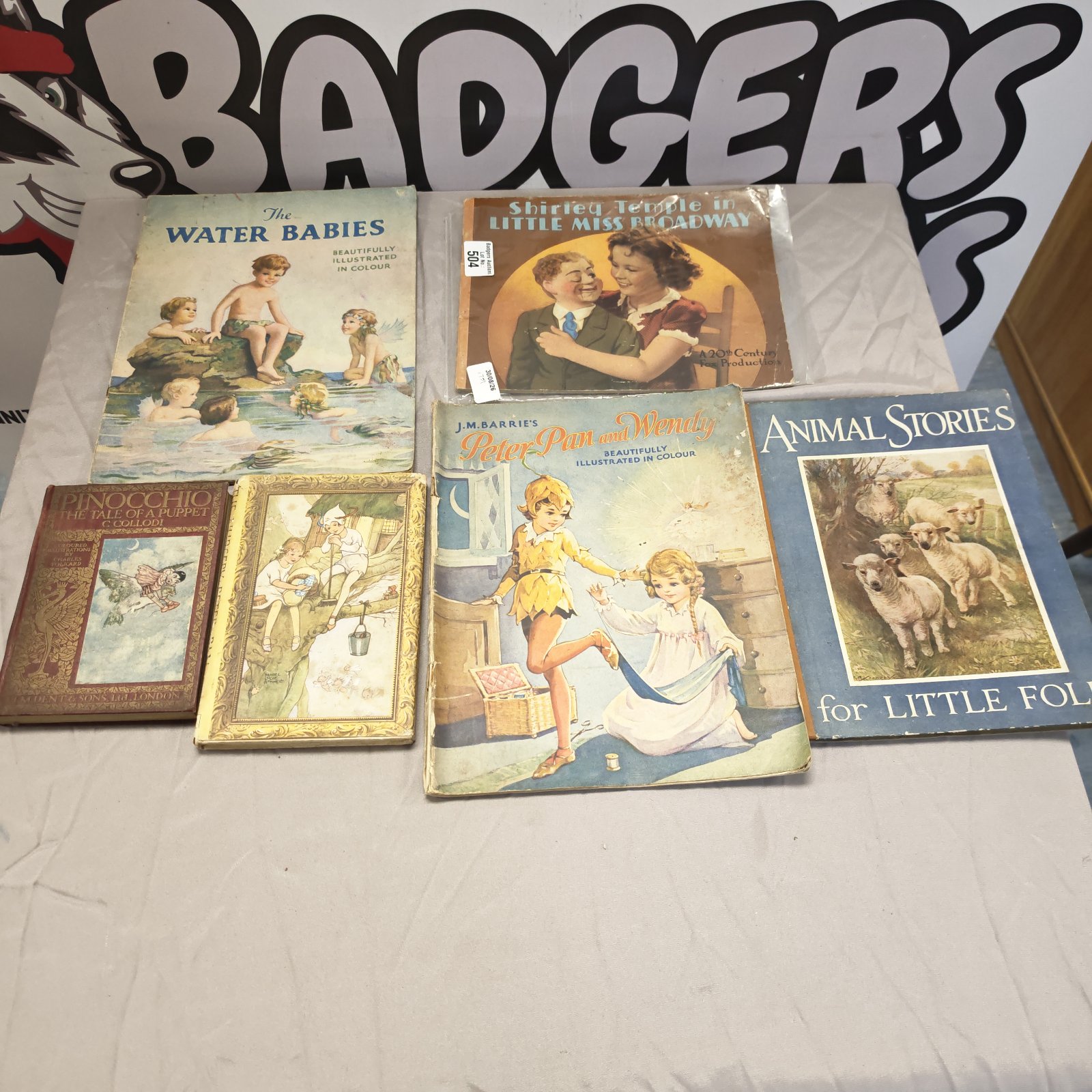 Vintage children's book bundle featuring Peter Pan and Shirley Temple.