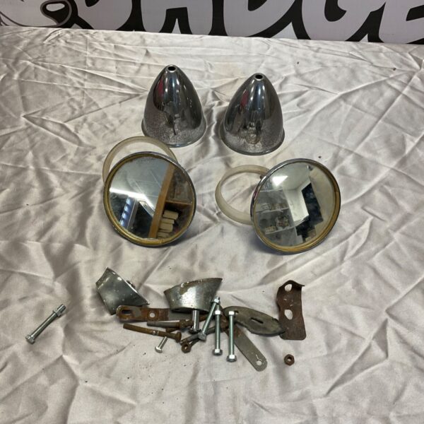 Vintage chrome racing mirrors with fittings for classic cars.