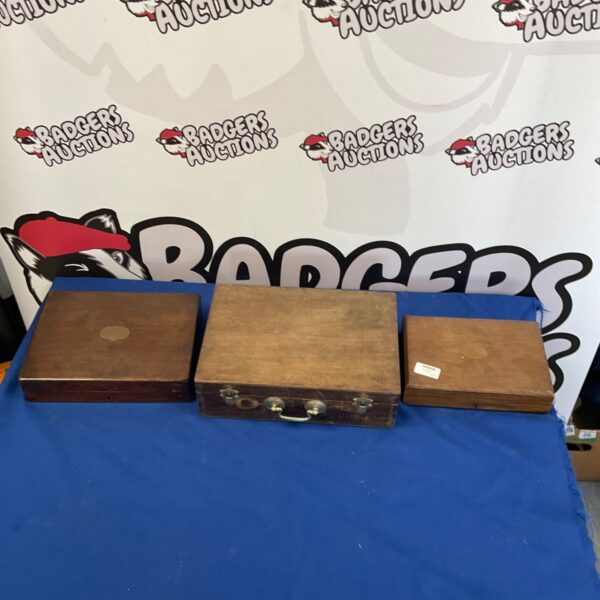 Lot of three vintage wooden cigar boxes for collectors.
