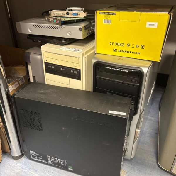 Vintage computer motherboard RS110 and other electronic components.