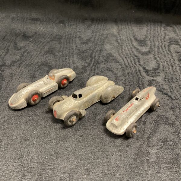 Vintage Dinky race cars, including Auto Union style model.