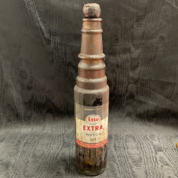 Vintage Esso Extra motor oil bottle with original label and contents.