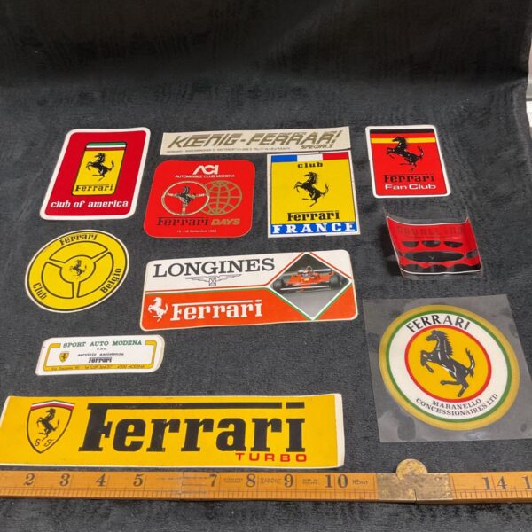 Vintage Ferrari stickers collection, automotive memorabilia.