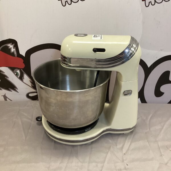 Cream vintage food mixer, retro kitchen appliance.