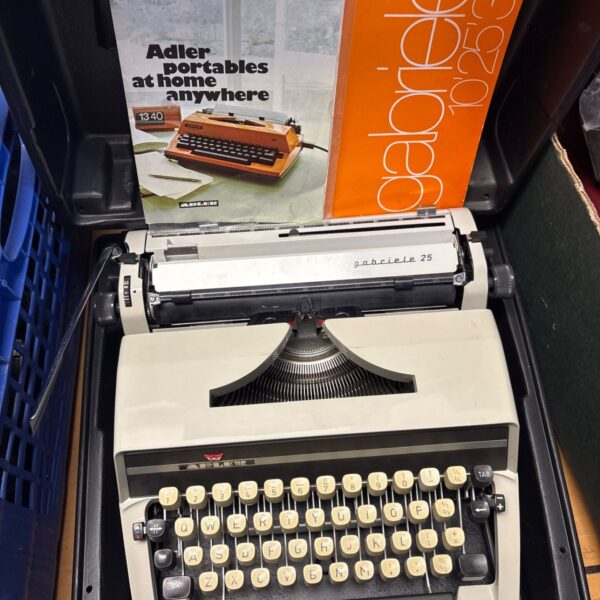 Vintage Gabriele 25 typewriter with case, a collectible office item.