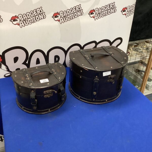 Pair of vintage blue hat boxes for storage and travel.
