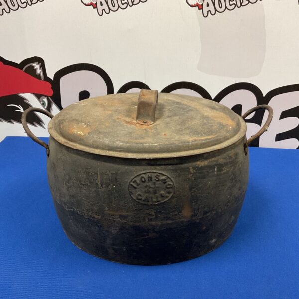 Vintage Izon & Co. cast iron cooking pot with handle.