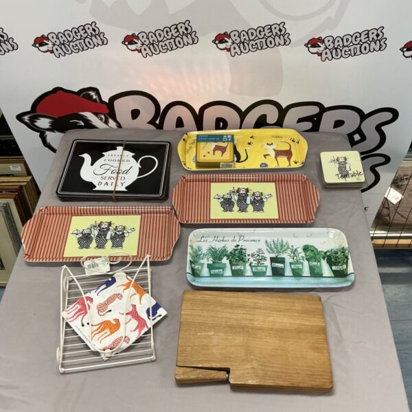 Vintage kitchenalia set with colourful trays and cheeseboard.