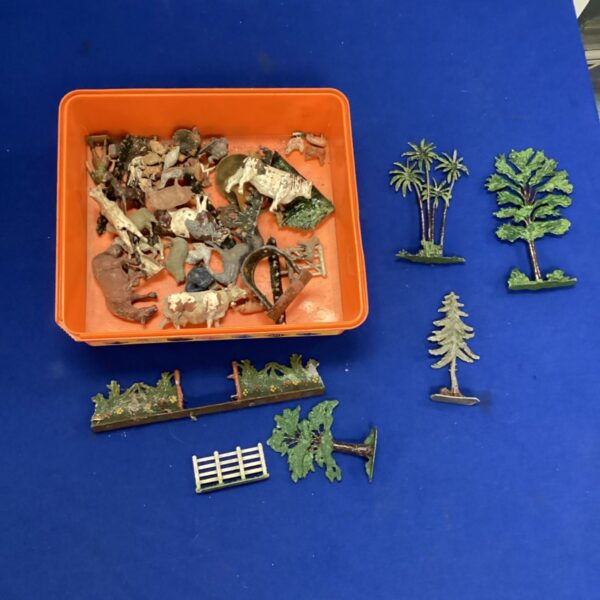 Box of vintage lead farm animals and scenery.