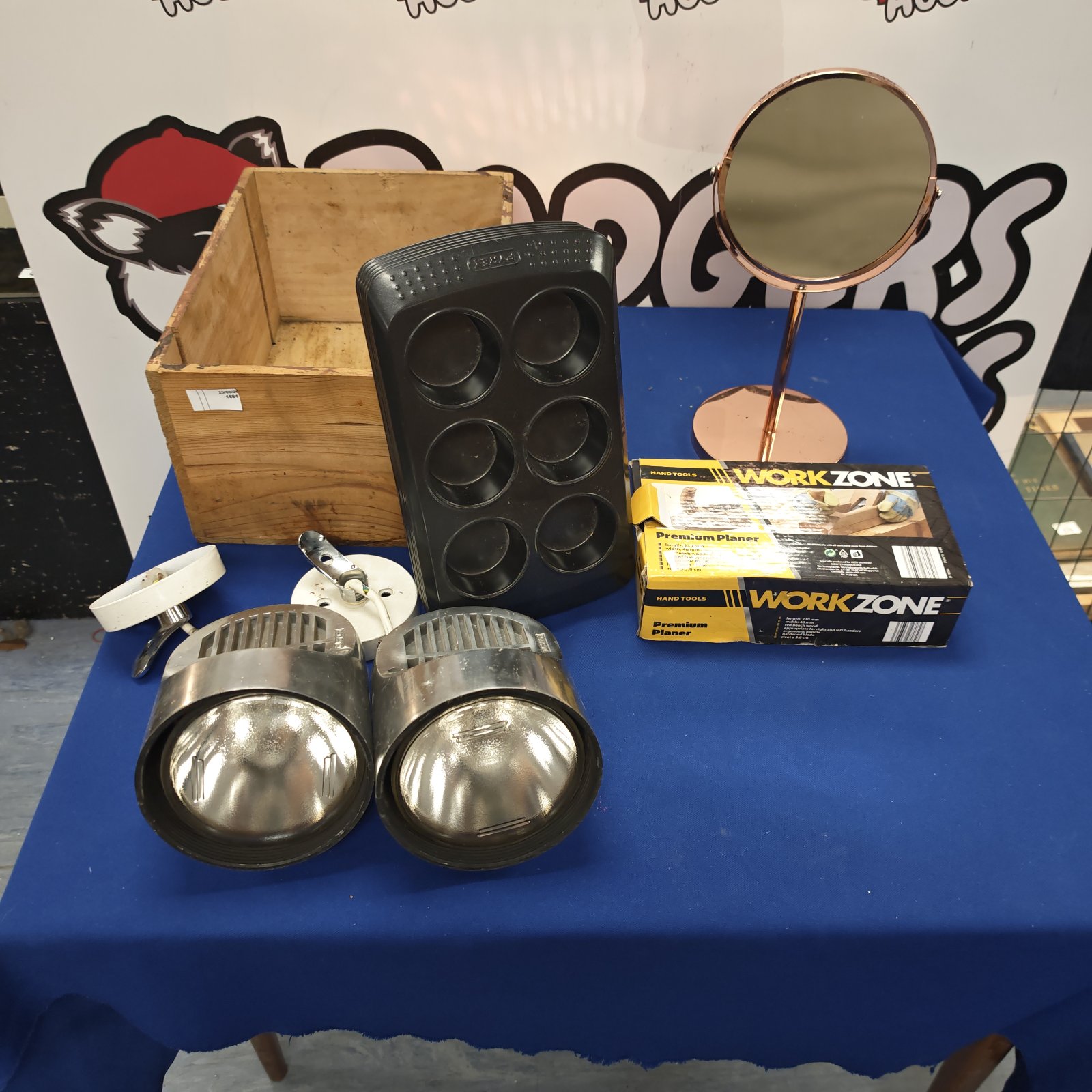 Vintage lighting and kitchenware lot including Pyrex and rose gold mirror.
