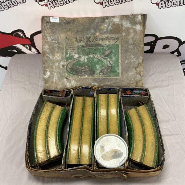 Vintage Marx Speedway track with two cars, a classic toy collectible.