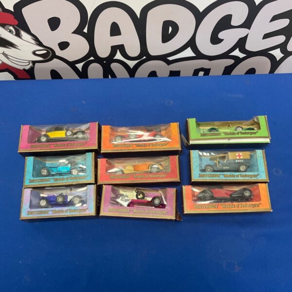 Vintage Matchbox Models of Yesteryear diecast cars in boxes.