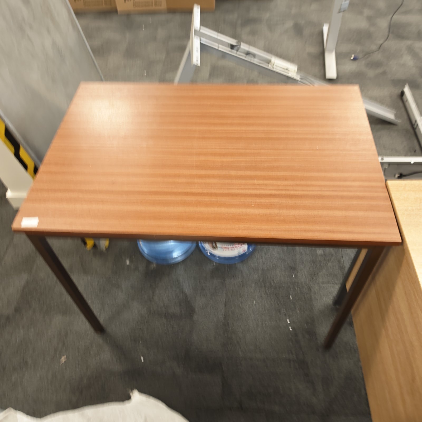 Vintage metal framed desk with wooden top, ideal for office use.