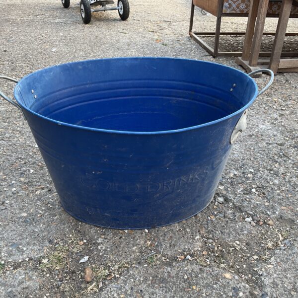 Vintage metal ice bucket labelled "COLD DRINKS" with handles.